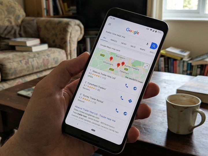 A phone screen showing Google search results for trailer hire near me